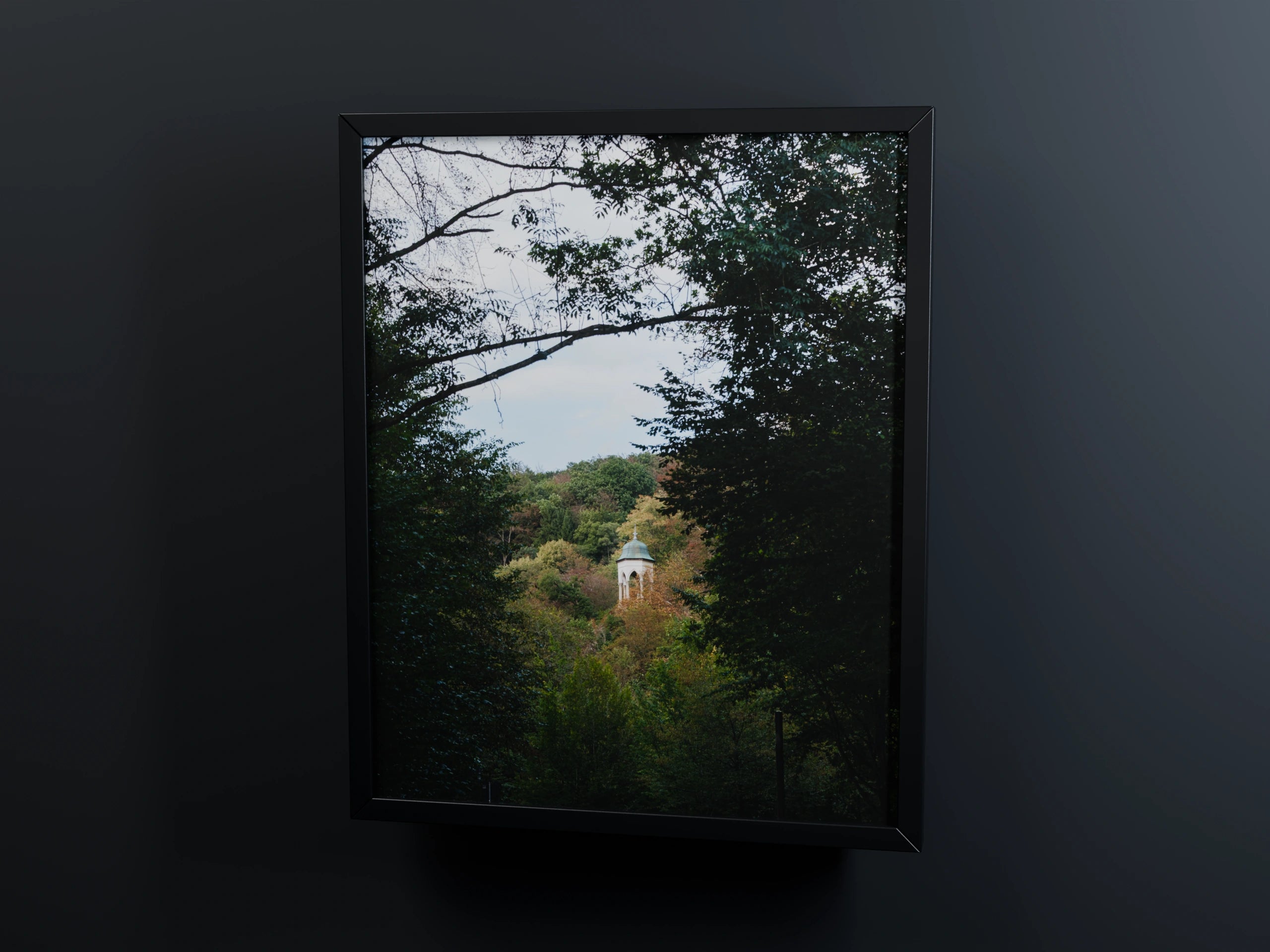 Tower photograph in a black frame on a dark background – 3D view